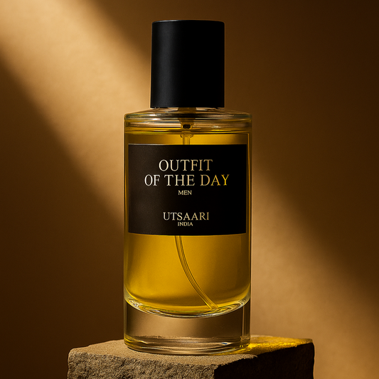 Perfume bottle labeled 'Outfit of the Day' by Utsaari on a stone block with a warm brown background